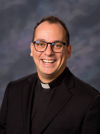 Photo of Reverend Ryan J. Mann