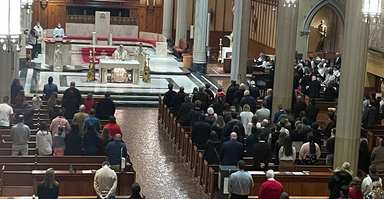 First diocesan young adult Mass focuses on Jesus, redeemer and king