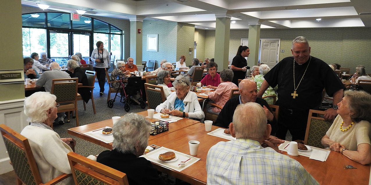 Visit by Bishop Perez brightens Emerald Village residents’ day
