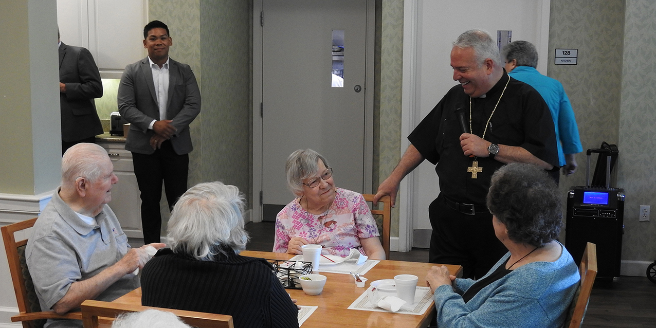 Visit by Bishop Perez brightens Emerald Village residents’ day