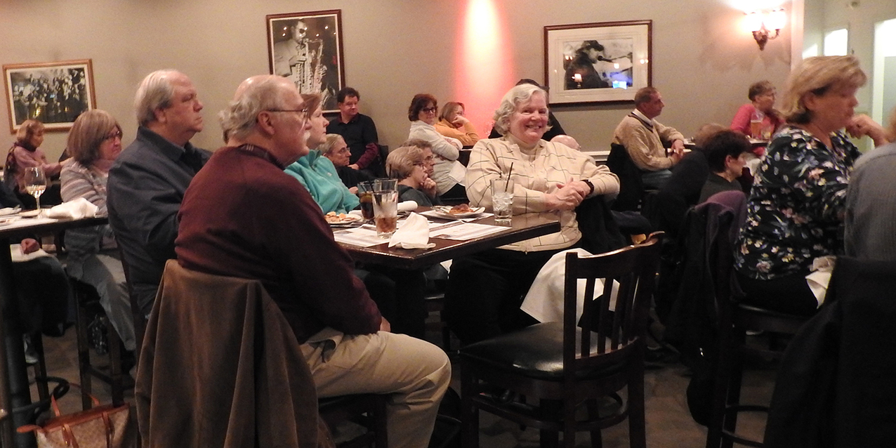 Father John Manning takes Theology on the Rocks group on a tour of diocesan history