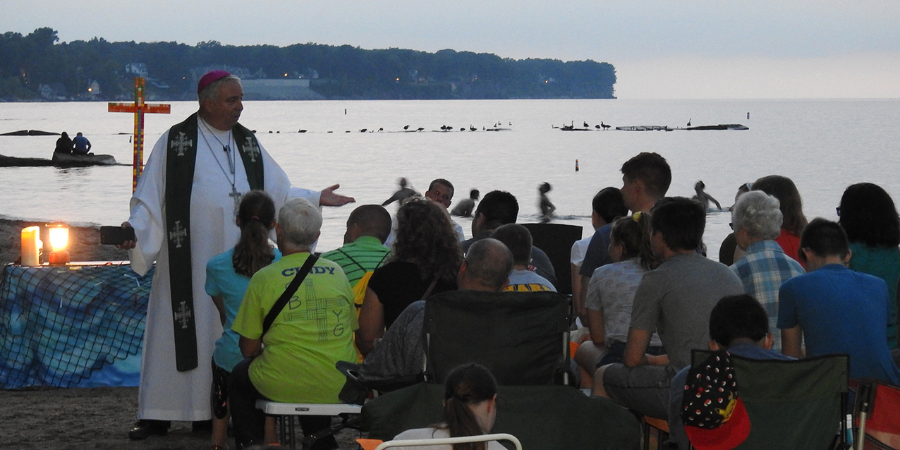 Sultry summer night rally helps teens fan the flame of their faith