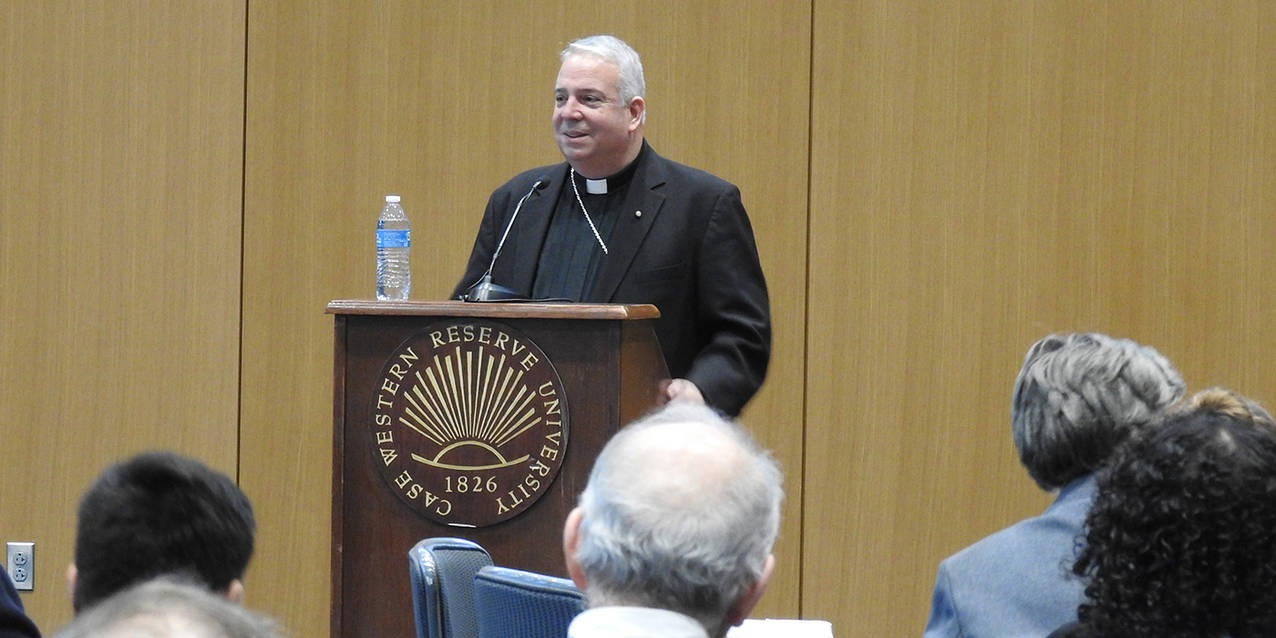 Immigration is a human story, bishop tells group at Case Western Reserve University