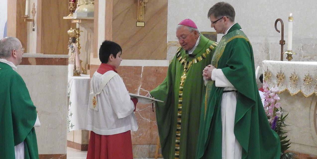 Father Joseph Eddy installed as Our Lady of Mount Carmel West pastor