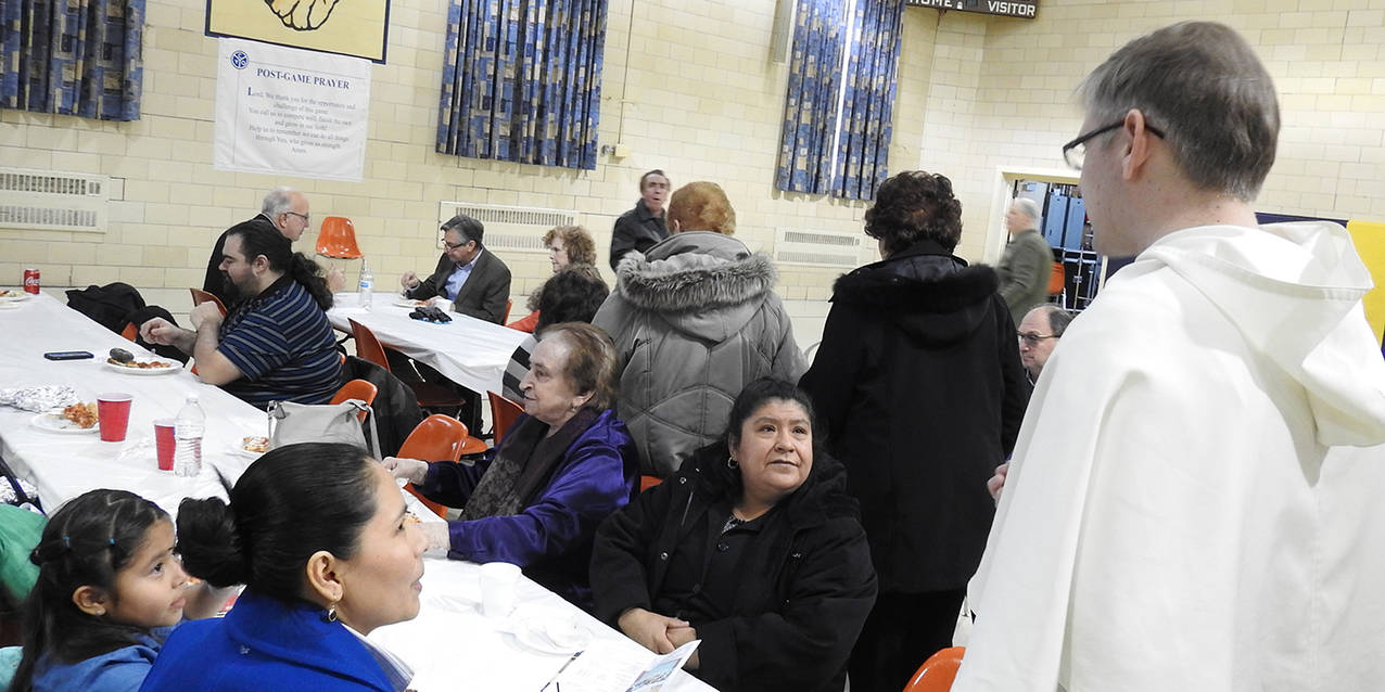 Father Joseph Eddy installed as Our Lady of Mount Carmel West pastor