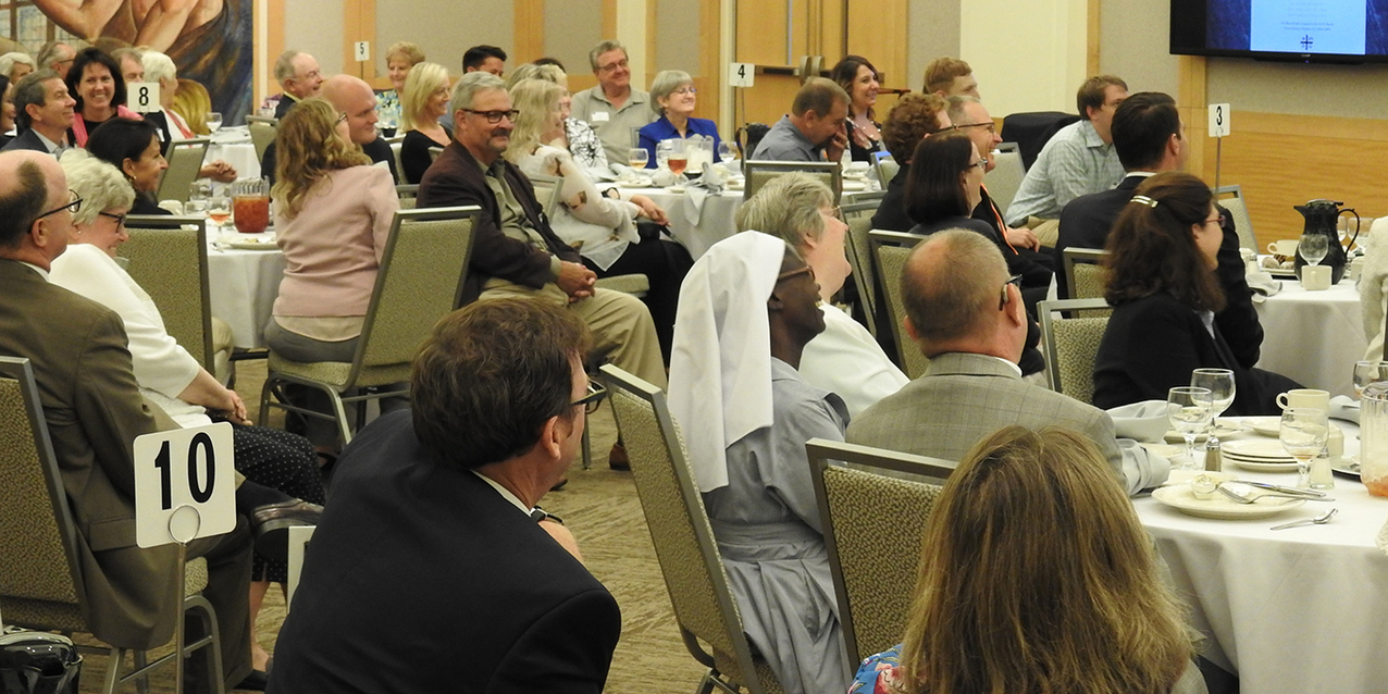 Father Bryan Norton shares priesthood journey with First Friday Club of Cleveland