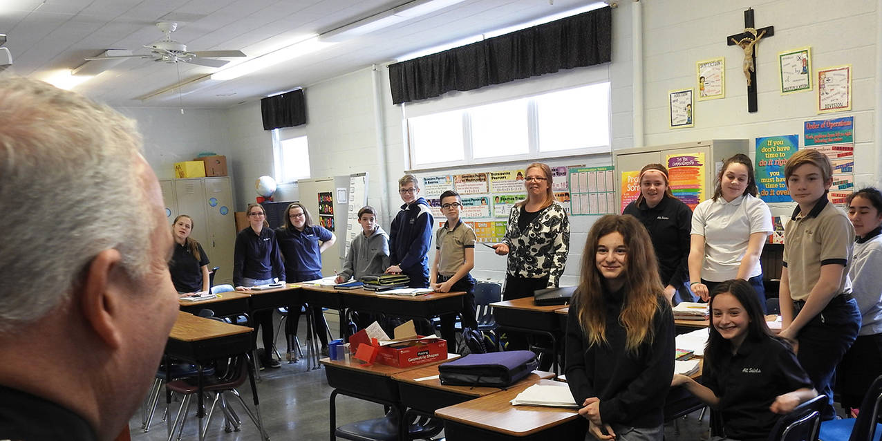 All Saints School celebrates bishop’s visit, basketball title