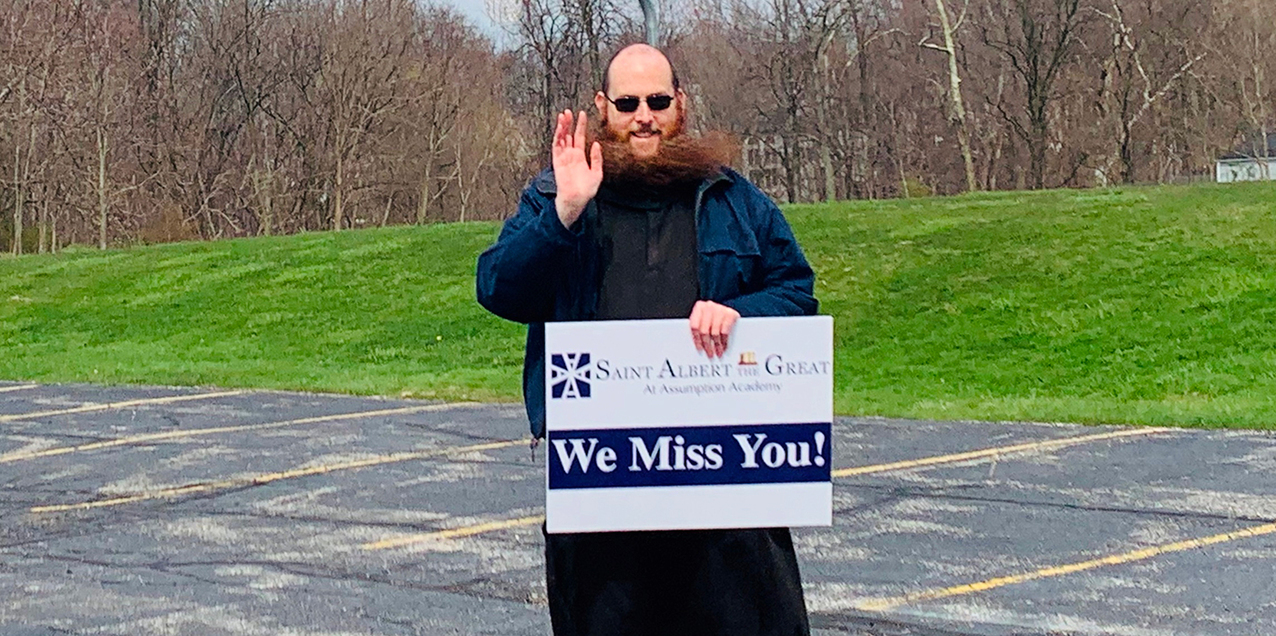 Drive-through spirit rally peps up St. Albert the Great at Assumption Academy community