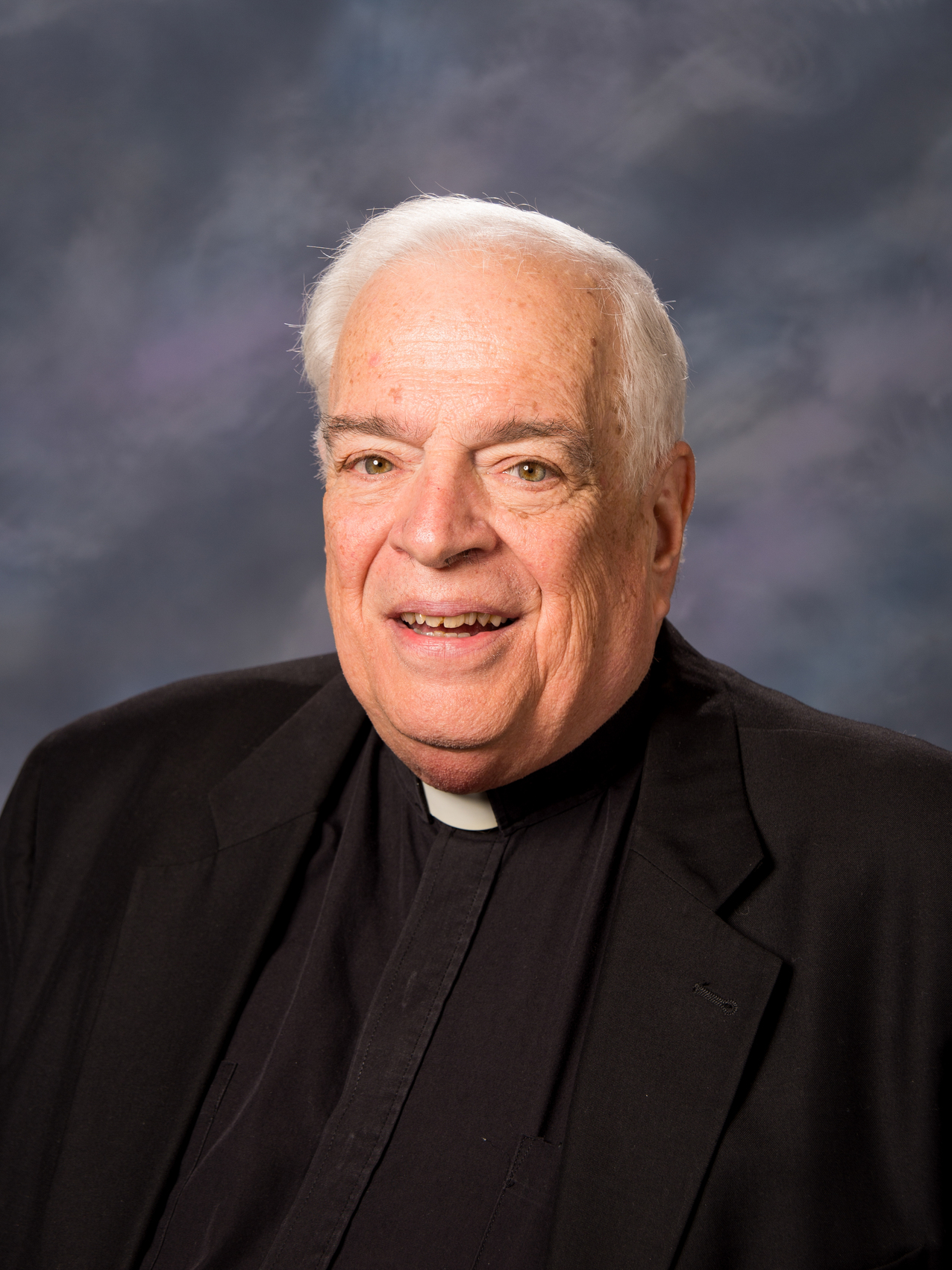 In remembrance – Father John E. Manning, senior priest-retired