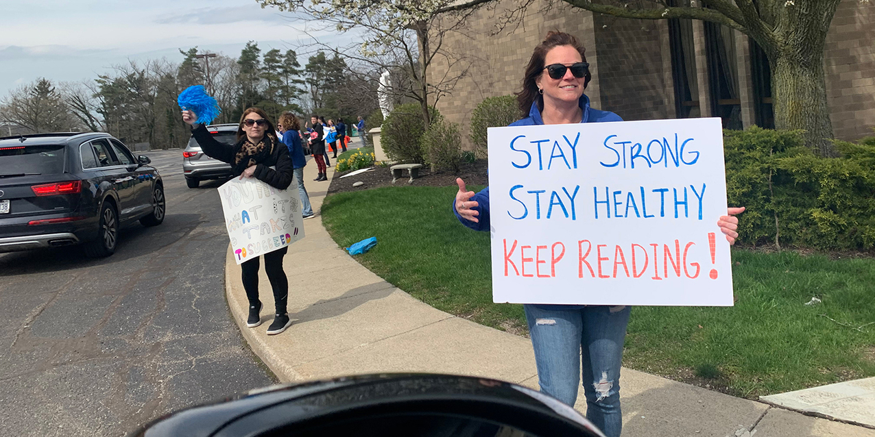 Drive-through spirit rally peps up St. Albert the Great at Assumption Academy community