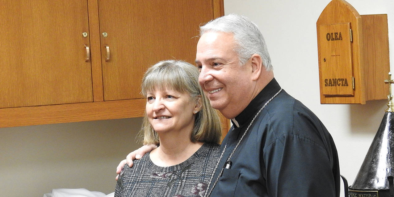 All Saints School celebrates bishop’s visit, basketball title