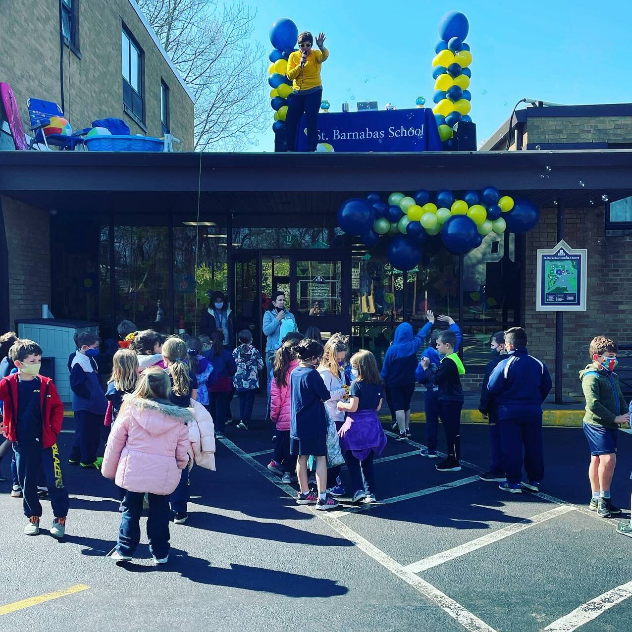 St. Barnabas School principal heads to the roof to fulfill a bargain with students