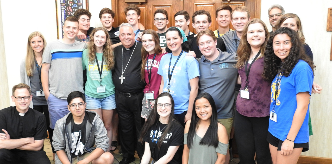 Teens at Tolle Lege Institute break bread, share thoughts with bishop