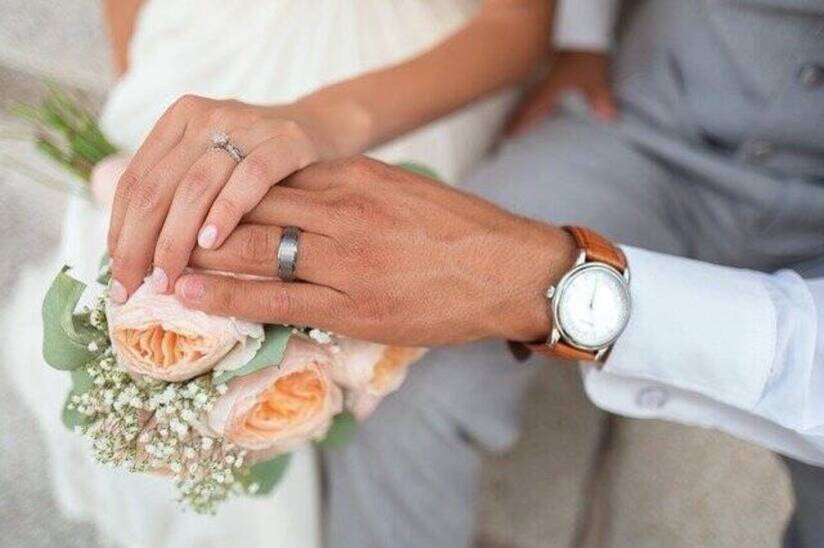 Bride and groom hands